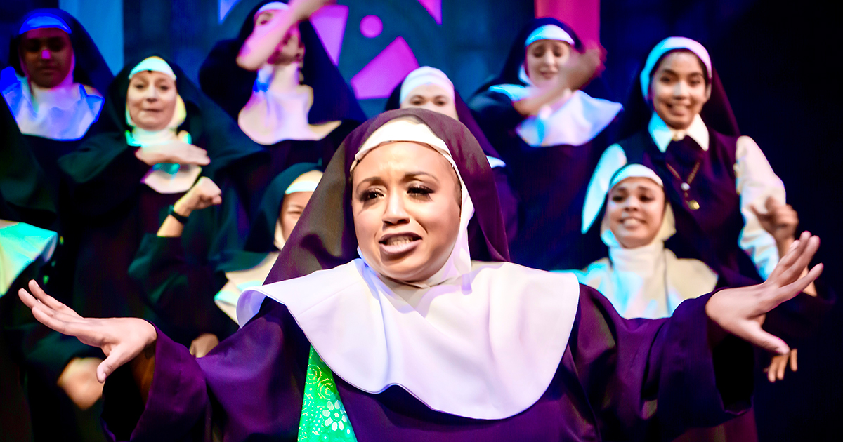 Cast members dressed as nuns performing in Sister Act: The Musical